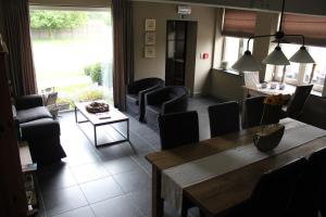 Posezení v ubytování B&B de Rijcke Rust