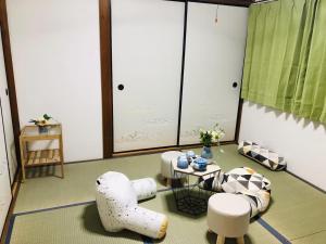 Fotografie z fotogalerie ubytování 近难波心斋桥 交通便利机场直达 日式传统一户建Yuan House NH-101 v Osace