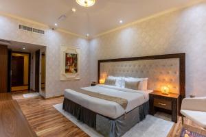 Postel nebo postele na pokoji v ubytování Ras Al Khaimah Hotel