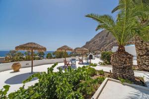 a resort with a view of the ocean at Ancient Thera Apartments in Kamari