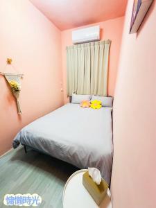 Giường trong phòng chung tại Lazy Time B&B