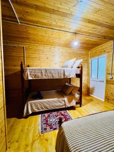 Ένα ή περισσότερα κρεβάτια σε δωμάτιο στο Guesthouse Zgiboza