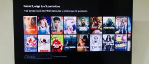 a television screen with a bunch of movies on it at Comfort Depa in Matamoros