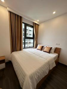 Giường trong phòng chung tại Nancy Homestay - Hoang Huy Commerce Apartment +11 ảnh