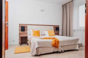 Postel nebo postele na pokoji v ubytování Hotel Sphinx