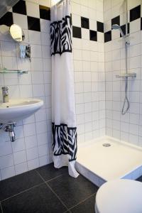 Koupelna v ubytování Het Groene Wout + 37 fotografií