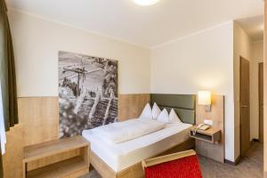 Voodi või voodid majutusasutuse Urdlwirt - Hotel & Restaurant toas