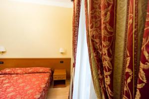 Postel nebo postele na pokoji v ubytování Funny Palace Hostel