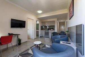 Un televizor și/sau centru de divertisment la Argus Hotel Darwin