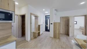 Kuchyň nebo kuchyňský kout v ubytování Apartmán Petőfiho