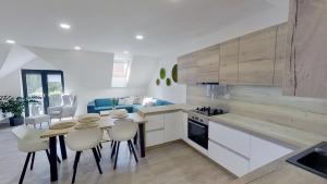 Kuchyň nebo kuchyňský kout v ubytování Apartmán Petőfiho