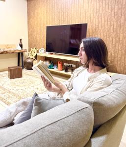 TV a/nebo společenská místnost v ubytování Endhaa, Divers Home