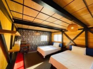 HOTEL COCOA RESORT客房内的一张或多张床位