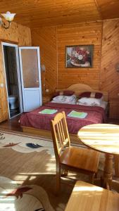 Postel nebo postele na pokoji v ubytování Яблучко