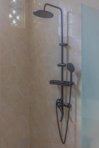 Ένα μπάνιο στο Villa Rose 1 Sanur