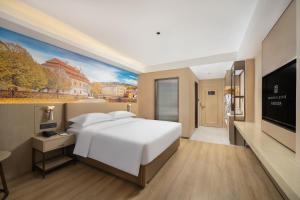 Mynd úr myndasafni af Landis Hotel í Wuqia