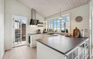 a kitchen with a large counter top in a room at 3 Bedroom Stunning Home In Hejls in Hejls