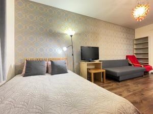 Postel nebo postele na pokoji v ubytování Superior Bukowińska, Studio, Pool & Gym! Metro Wilanowska, Garage parking! 24h reception! + 16 fotografií
