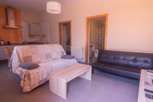 Χώρος καθιστικού στο Apartamentos Turísticos Domus Aquae