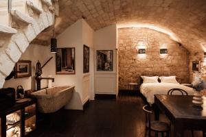 Ένα ή περισσότερα κρεβάτια σε δωμάτιο στο V1 Loft Suite di design con tetto di vetro Business, Relax, Occasioni speciali