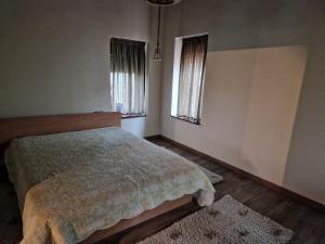 Postel nebo postele na pokoji v ubytování Sunflower Apartment