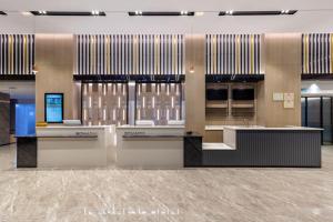 Φωτογραφία από το άλμπουμ του Echarm Hotel Zigong Ma Dangshui Wanda Plaza Branch σε Shuping