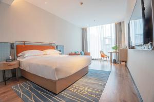 Φωτογραφία από το άλμπουμ του Echarm Hotel Zigong Ma Dangshui Wanda Plaza Branch σε Shuping