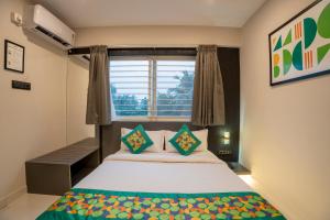 Voodi või voodid majutusasutuse Treebo Sanmaya Retreat, 15 Mins From Mysore Palace toas