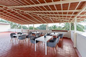 Rõdu või terrass majutusasutuses Treebo Sanmaya Retreat, 15 Mins From Mysore Palace