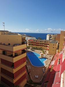 a view of a pool from a building at Apartment Puerto de Santiago in Puerto de Santiago