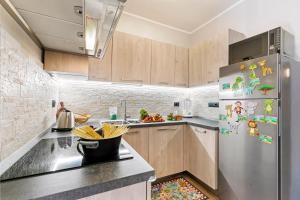 Kuchyň nebo kuchyňský kout v ubytování Appartamento Il Palazzo - Happy Rentals