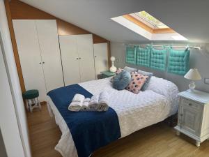 Posteľ alebo postele v izbe v ubytovaní Apartamento Saint Michael Blue