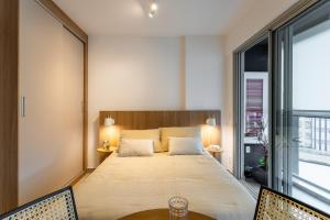 Postel nebo postele na pokoji v ubytování ARVO Luxury Studio Rebouca Apartment