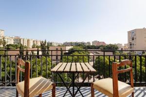En balkon eller terrasse på Mar de la Abadía Rooms Shared Apartment