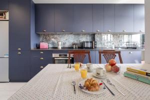 Køkken eller tekøkken på Mar de la Abadía Rooms Shared Apartment