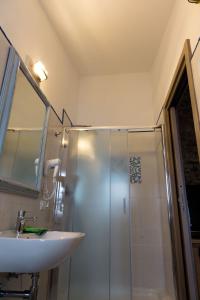 a bathroom with a shower and a sink at La corte dei tre in Torre del Lago Puccini