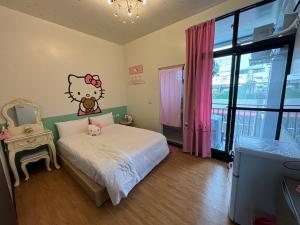 Voodi või voodid majutusasutuse Chaonima B&B 潮尼馬民宿 toas