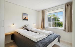 Postel nebo postele na pokoji v ubytování Holiday Home Strandgårdsvej Bagenkop X