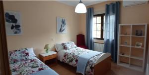 Кровать или кровати в номере Casa Rural La Gospa +29 фотографий