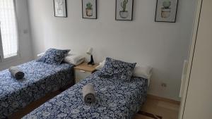 Piso Centrico 1.5km Playa con gran terraza +vistas客房内的一张或多张床位