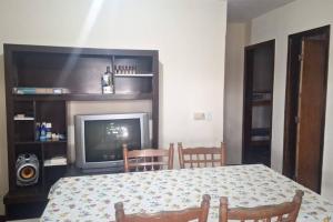 Χώρος καθιστικού στο Quarto para quatro pessoas a duas quadras da praia - Balneário Saint Etienne - Matinhos