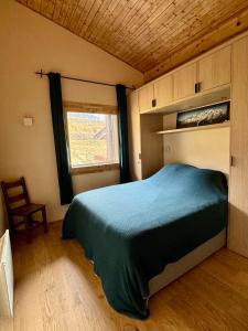 Postel nebo postele na pokoji v ubytování Grand appartement rénové de 110m2 aux Contamines