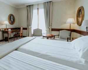 Postel nebo postele na pokoji v ubytování Hotel Cándido