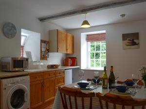 Kuchyň nebo kuchyňský kout v ubytování Shore Cottage - Uk12524