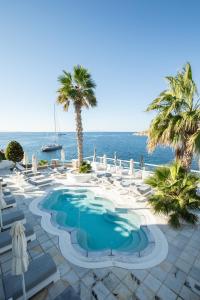 Bazén v ubytování Nissaki Boutique Hotel nebo v jeho okolí