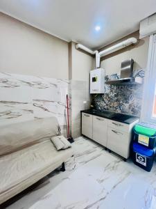 a hospital room with a bed and a counter at APT Umi 22 in Linate