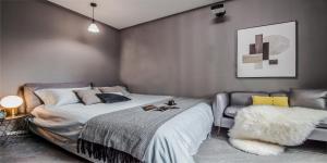 Postel nebo postele na pokoji v ubytování 上海柠檬汁民宿 Shanghai lemon juic B&B -Shanghai Lemon Deluxe Room外滩南京东路步行街