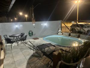 A piscina localizada em Apto térreo #3- Moradas do Pier- 2 quartos, 1 banheiro a passos da areia ou nos arredores