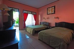 Gallery image of Pesona Beach Inn in Kuta
