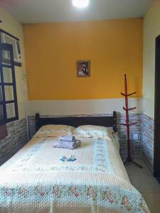 Postel nebo postele na pokoji v ubytování Pousada Do Tio Ze